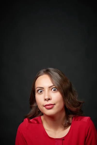 Woman in red shirt and wavy hair — Stock Photo, Image