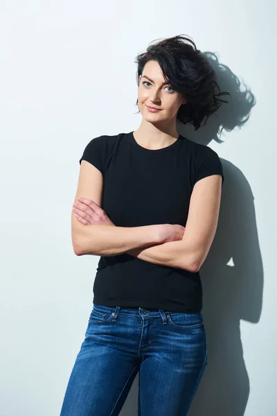 Bright brunette woman in black tshirt — Stock Photo, Image