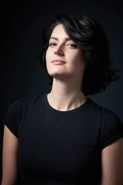 Bright brunette woman in black tshirt — Stock Photo, Image