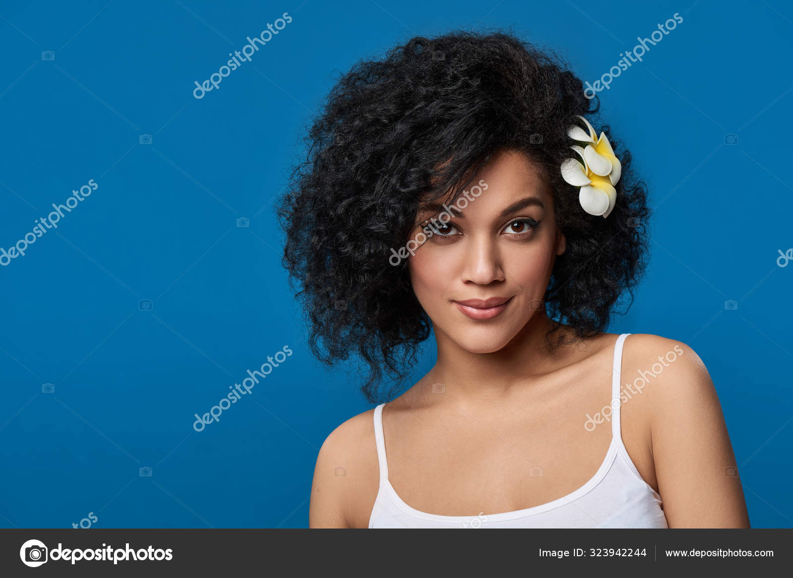 Woman Exotic Plumeria Flower In Her Hair Stock Photo