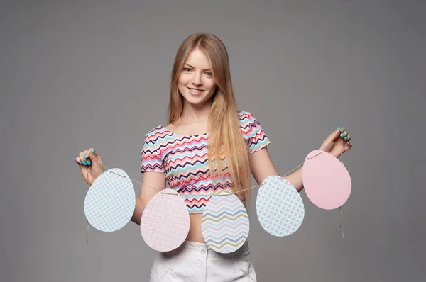 Smiling Girl Holding Banner Five Easter Eggs Shape — Stock Photo, Image