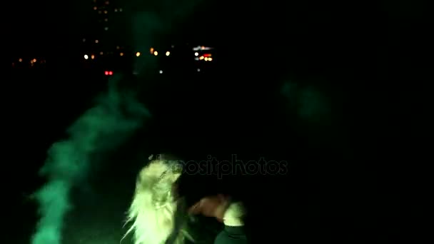 Young beautiful sexy girl with a fiery fire by night dancing — Stock Video