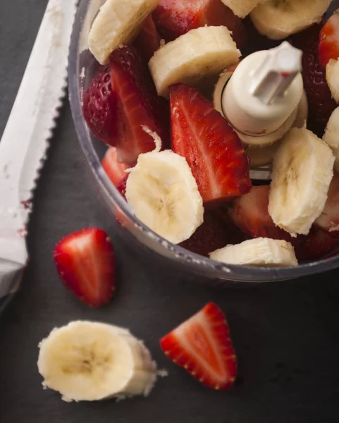 Strawberry banana fruit in a blender ready to blend — Stock Photo, Image
