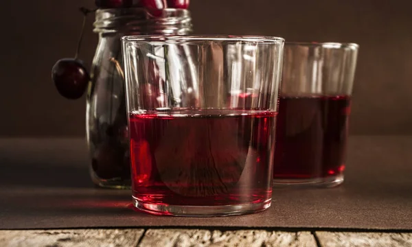 Glass of fresh cherry juice — Stock Photo, Image