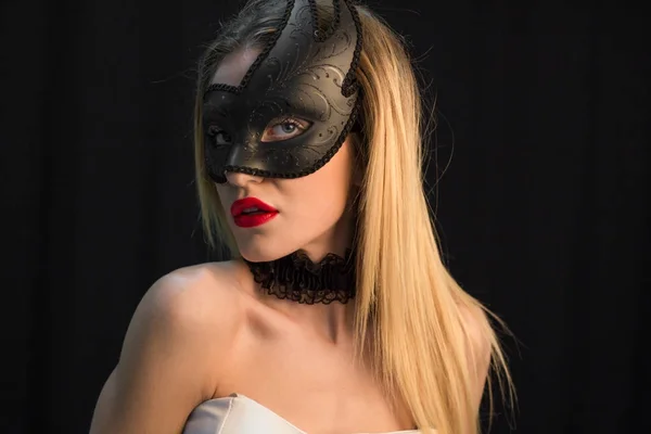 young Mystic woman posing  in mask
