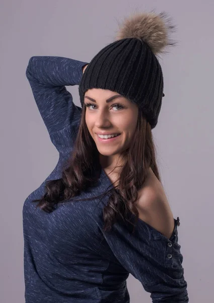 Attractive young woman in a winter,  fashion shot