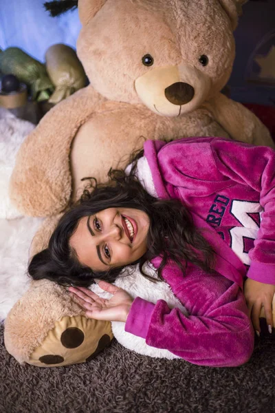 cute girl posing with teddy bear