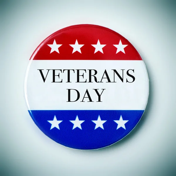 Text veterans day in a badge — Stockfoto