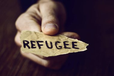 piece of paper with the word refugee clipart