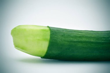 cucumber with the skin of its tip removed clipart