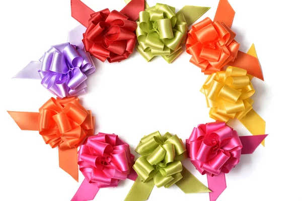 Gift ribbon bows forming a circle — Stock Photo, Image