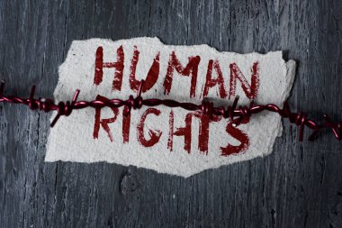 barbed wire and text human rights clipart