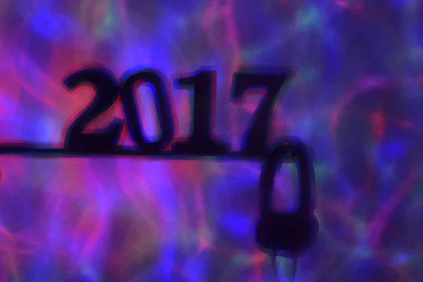 Номер 2017, как новый год, и наушники — стоковое фото