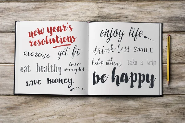 Rezoluții de ani noi într-un notebook — Fotografie, imagine de stoc
