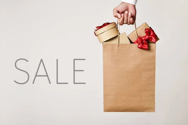 Shopping bag con regali e vendita di parole — Foto Stock