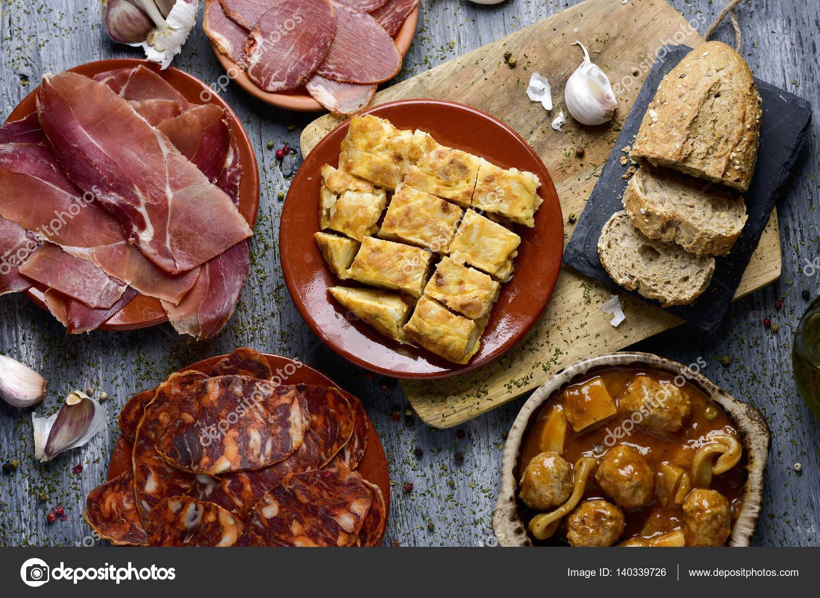 Assortment of spanish cold meats and tapas — Stock Photo © nito103
