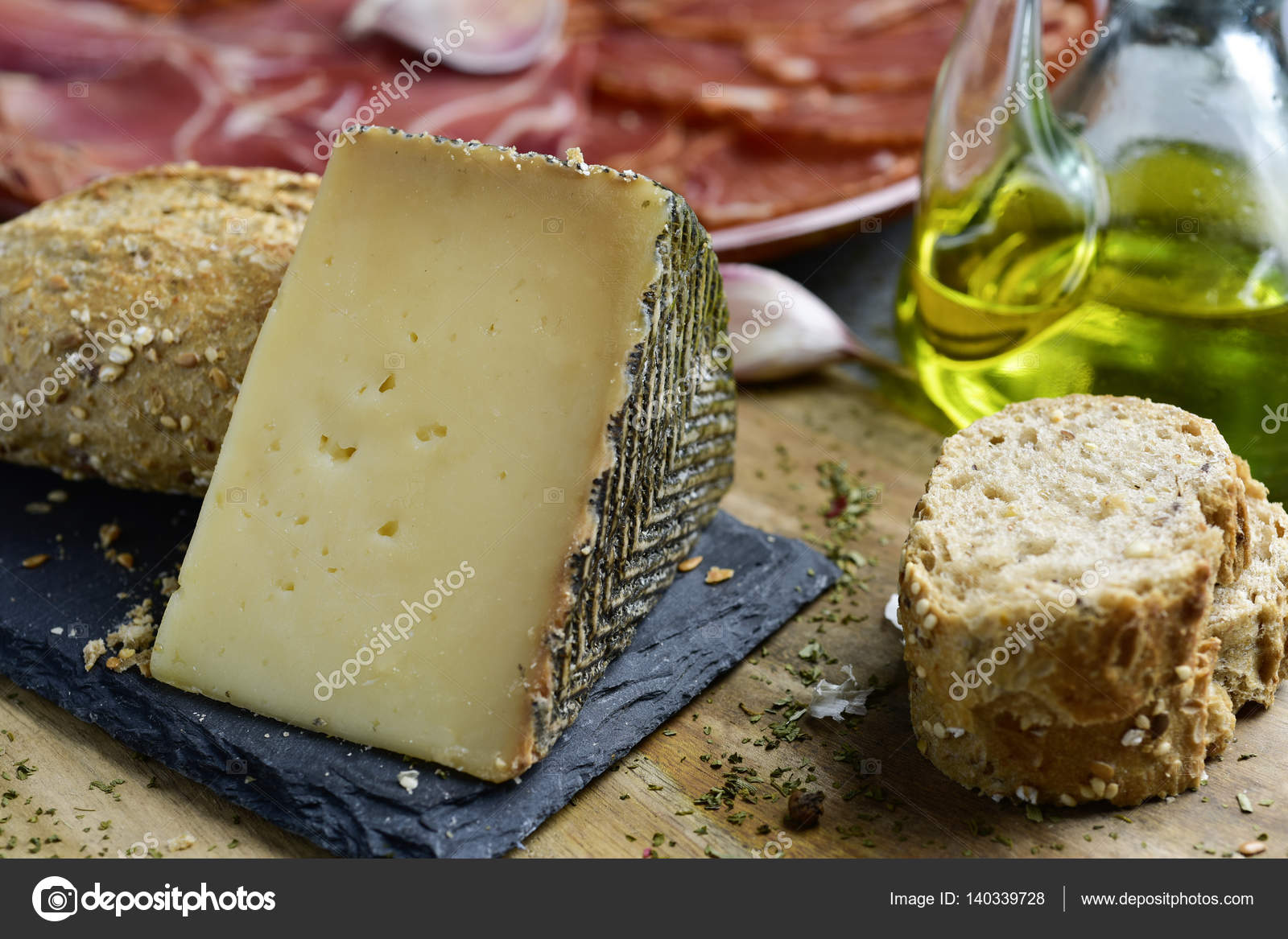 Manchego cheese and spanish cold meats Stock Photo by ©nito103 140339728