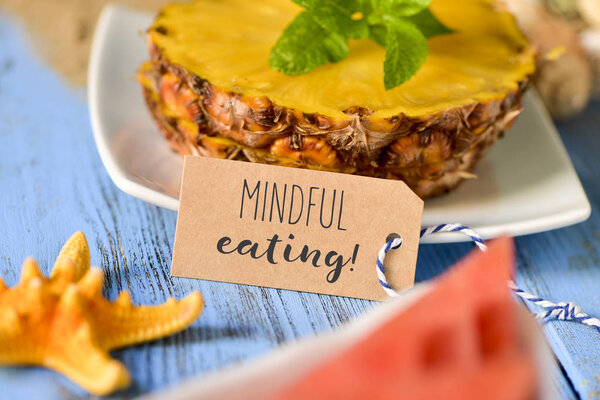 pineapple, watermelon and text mindful eating