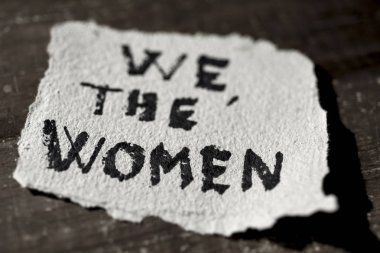 text we the women in a piece of paper clipart
