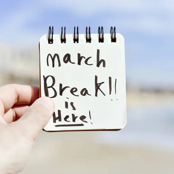 Text march break is here in a notepad — Stock Photo, Image