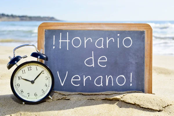 Текст huso horario de verano, summer time in spanish — стоковое фото