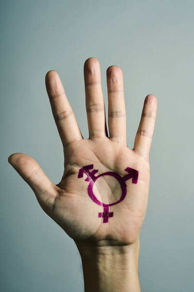 transgender symbol in the palm of the hand