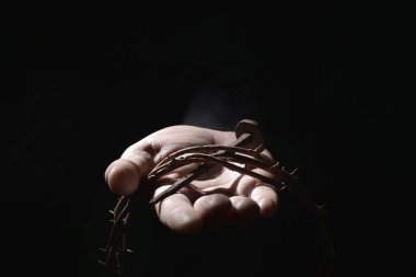 man with a nail and a crown of thorns clipart