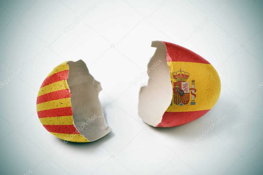 cracked eggshell with Catalan and Spanish flags