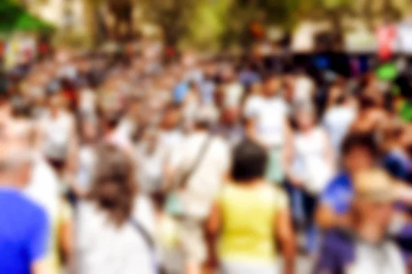 Fondo borroso desenfocado de personas caminando o marchando — Foto de Stock