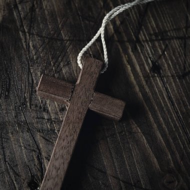 wooden cross with a cord clipart