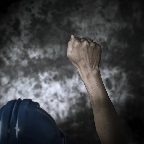 Worker with his fist raised to the air — Stock Photo, Image