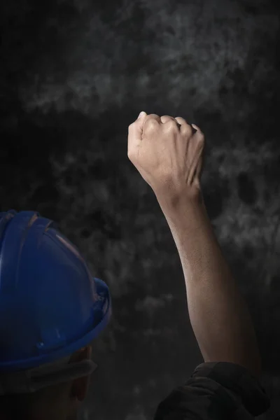 Worker with his fist raised to the air — Stock Photo, Image