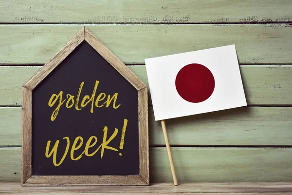 Texto semana dourada e bandeira japonesa — Fotografia de Stock