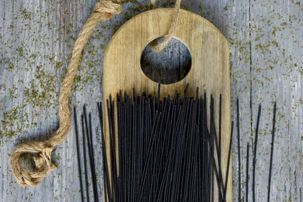 Uncooked black spaghetti — Stock Photo, Image
