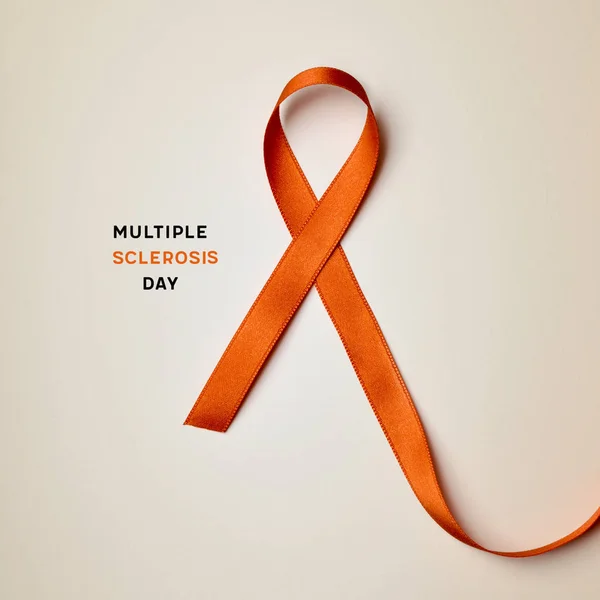 Orange ribbon and text multiple sclerosis day — Stock Photo, Image