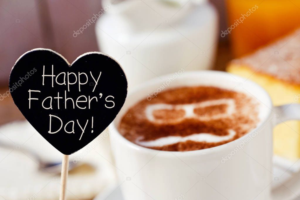 text happy fathers day and a cup of cappuccino