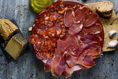 assortment of spanish cold meats clipart