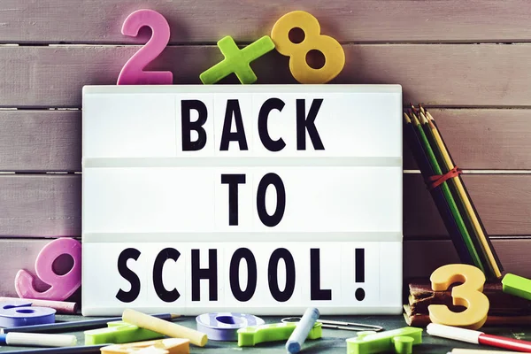 Text back to school in a lightbox — Stock Photo, Image