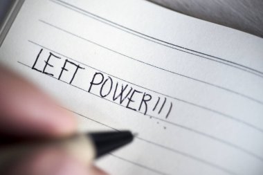 left-handed man handwriting the text left power clipart