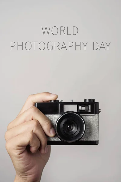 Film camera and text world photography day — Stock Photo, Image