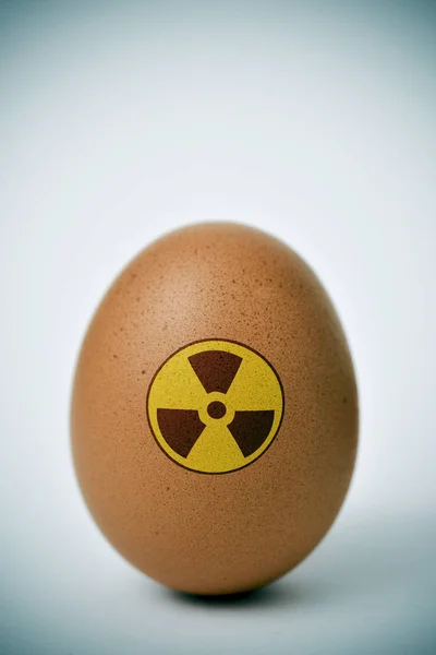 Egg with a toxic symbol — Stock Photo, Image