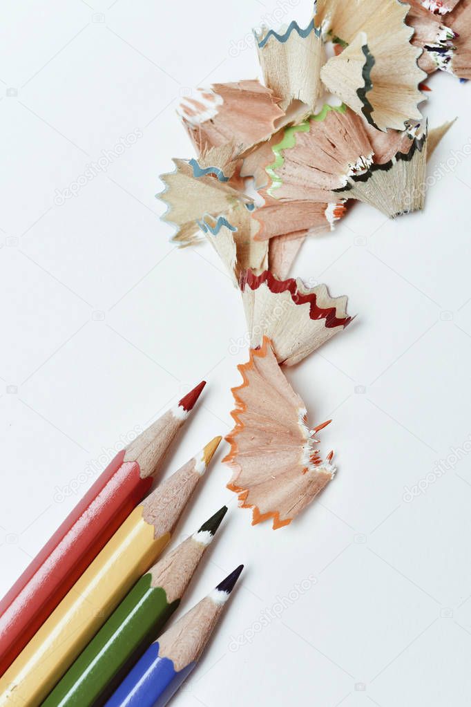 pencil crayons and shavings of different colors