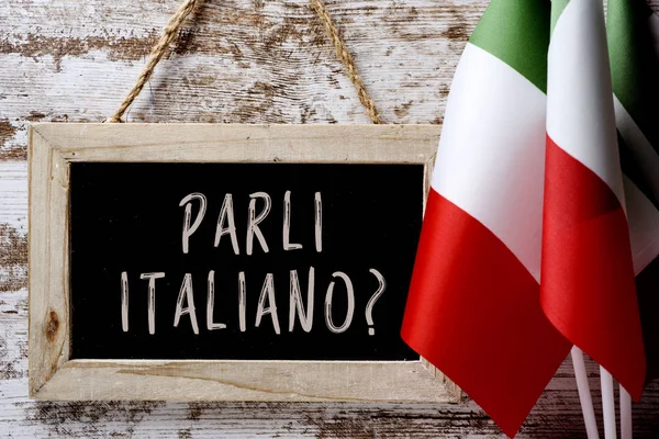 Питання parli italiano? Ви говорити італійською? — стокове фото