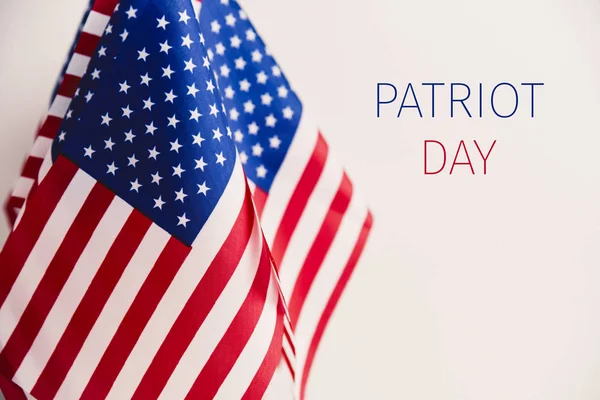 American flags and text patriot day — Stock Photo, Image