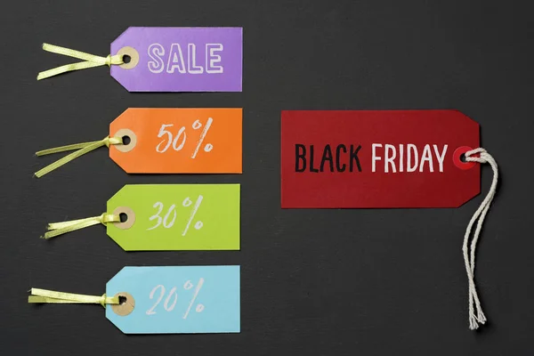 Black friday and labels with different percentages — Stock Photo, Image