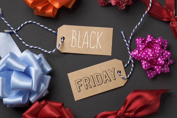 Text black friday in brown paper labels — Stock Photo, Image