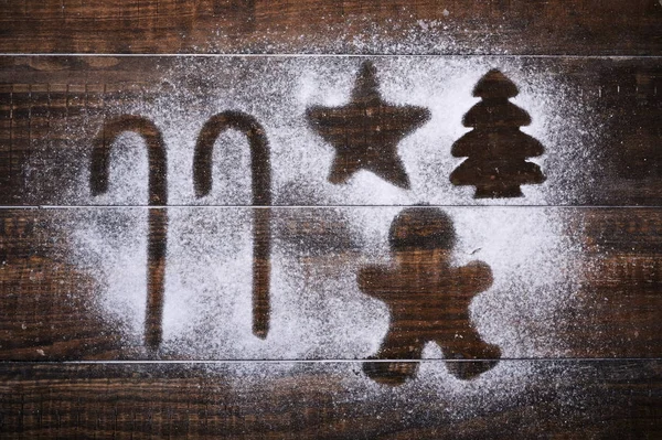 Zuckerstangen, Stern, Weihnachtsbaum und Lebkuchenmann — Stockfoto