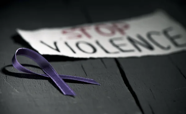 Purple ribbon against the violence against women — Stock Photo, Image