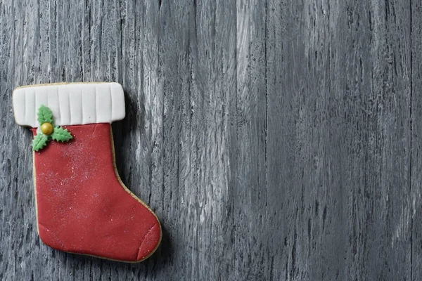 Biscoito na forma de uma meia de Natal — Fotografia de Stock