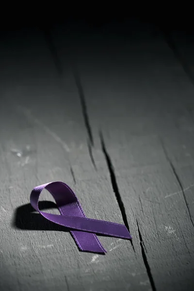 Purple ribbon against the violence against women — Stock Photo, Image